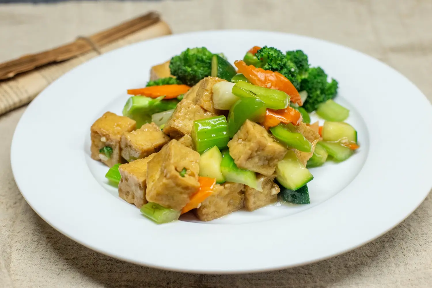 Fried tofu with broccoli, carrot, zucchini, celery, mushrooms and light garlic sauce at Happy Valley Wok, a Asian Restaurant in Happy Valley